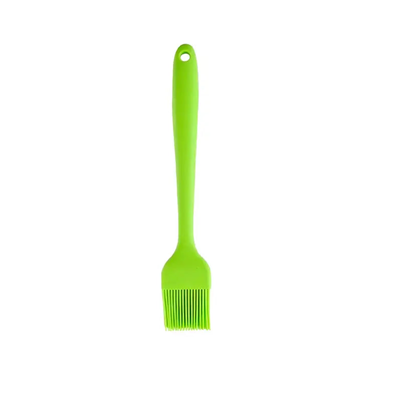 Pinceau de cuisine vert en silicone, longueur 26 cm, conçu pour badigeonner et étaler uniformément les ingrédients.